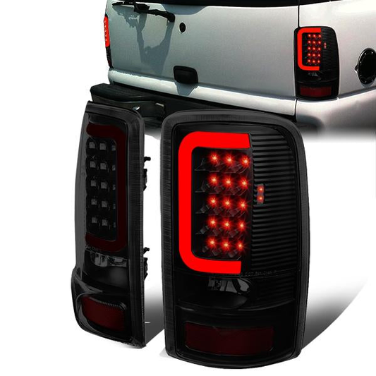 FAROS TRASEROS 00-06 CHEVY TAHOE , CHEVY SUBURBAN 1500 , 2500 , GMC YUKON , YUKON XL 1500 , 2500 - RED C-BAR - 3D - U-HALO LED - FITS LIFT DOOR MODELS ONLY , DOES NOT FIT BARN DOOR MODELS - BLACK / SMOKE